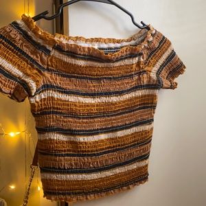 Off the shoulder sort of cropped shirt